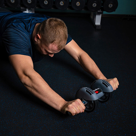 Ролик для пресса с возвратным механизмом